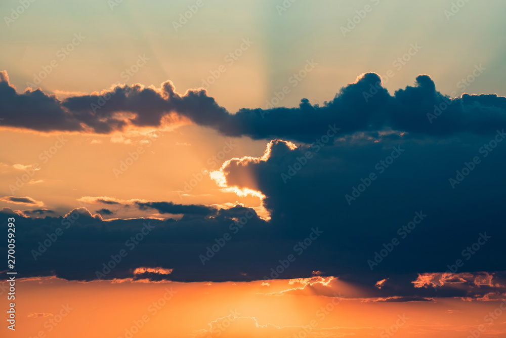 Fototapeta premium Beautiful dramatic sunrise skyscape background with clouds