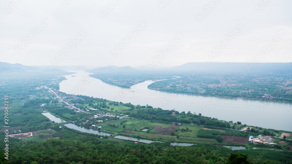 Top view of Mekong river with mountain and cloudy sky from NongKai, Thailand