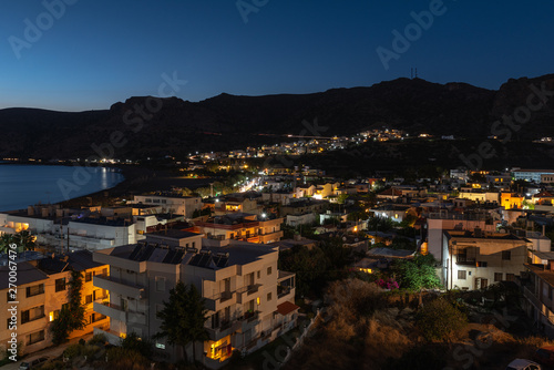 Aerial night view on Palaiochora town, south part of Crete island, Greece