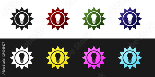 Set Solar energy panel icon isolated on black and white background. Sun and light bulb. Vector Illustration
