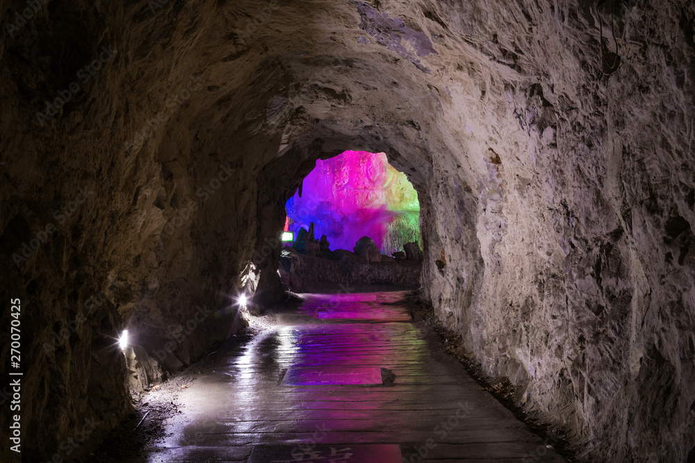 A dark, deserted underground tunnel