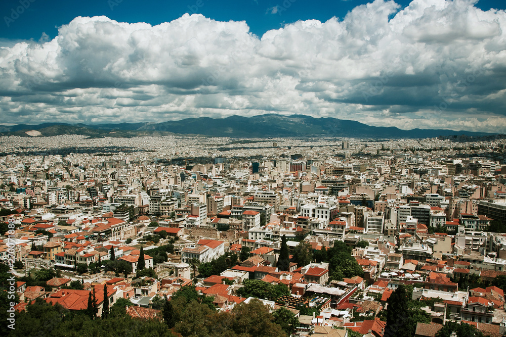 Top view cityscape. Summer blue sky with white clouds. European capital city of Greece-Athens.