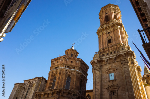 Tudela, Navarre, Spain - February, 13th, 2019 : 17th century Renaissance tower of the Cathedral of Saint Mary of Tudela in the Plaza Vieja square of the old town.