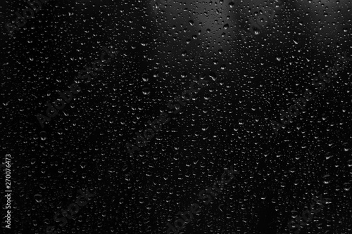 Water raindrops droplets on black background