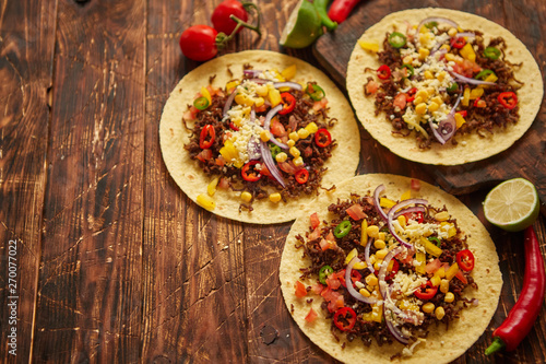 Healthy corn tortillas with grilled beef  fresh hot peppers  cheese  tomatoes