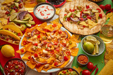 Various freshly made Mexican foods assortment. Placed on colorful table
