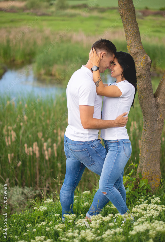 Love Couple in love romantic summer field. Love Couple in love romantic summer field.