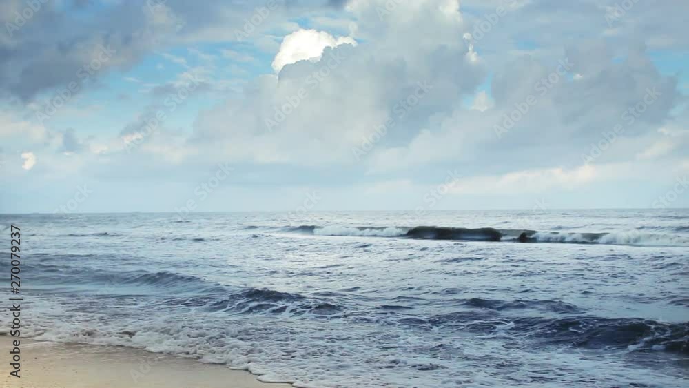Slow motion waves crashing on the beach Slow motion waves crashing on the beach