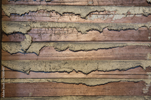 Detail of lath and plaster on an old wall