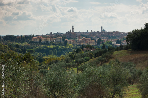 Hiking hills, backroads and vineyards at autumn, near Siena in Tuscany, Italy