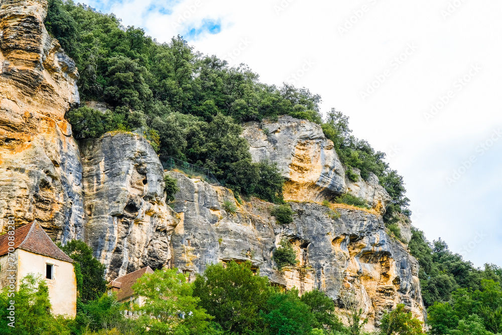 The village of La Roque Gageac, France. Cliffs hanging over the village.