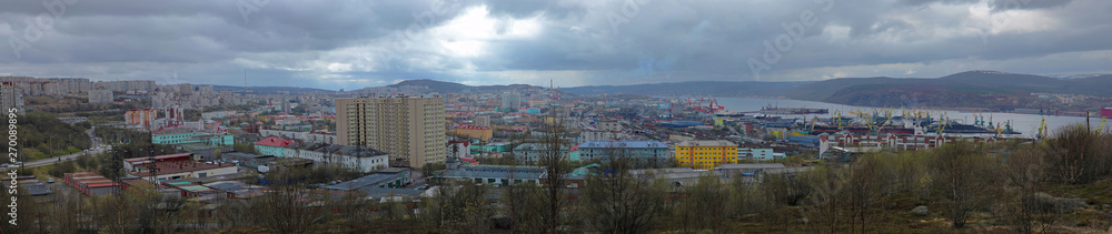 Panorama of the city of Murmansk in cloudy weather. The view from the observation deck of the memorial to the heroism 1941-1944