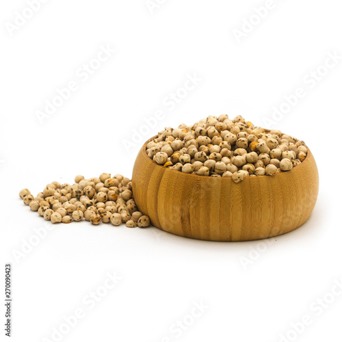 Spilled Chickpeas Next to Wooden Bowl – High Fiber Vegan Food Presentation

