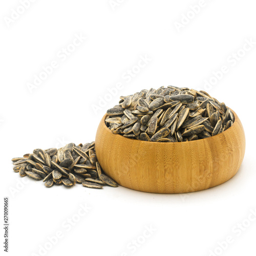 Roasted Sunflower Seeds – Salty Snack Displayed in Round Wooden Container