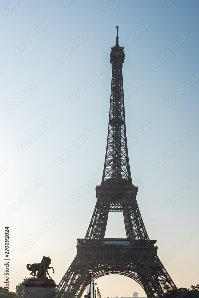 Morning sunrise in backlight on the Eiffel Tower in Paris