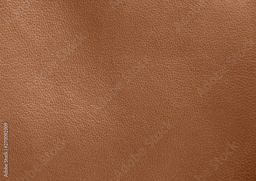 Texture of genuine leather. Brown background. The structure of the leather material close-up.