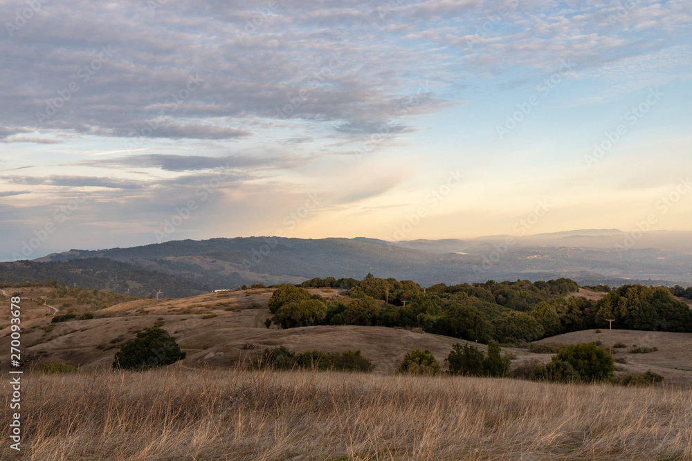 Sunset on silicon valley as seen from the top of Monte Bello open space above Palo Alto, California