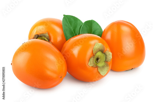 Persimmon fruit with leaves isolated on white background close-up