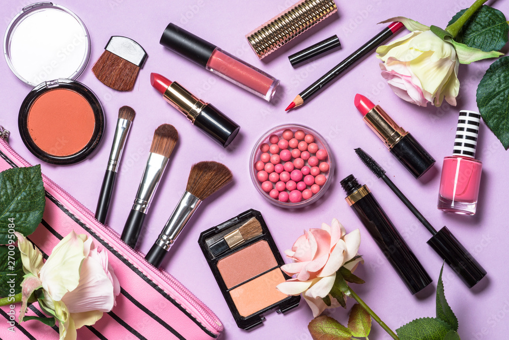 Makeup professional cosmetics on purple background. Makeup professional cosmetics on purple background.