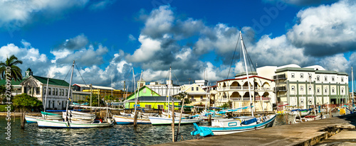 Houses and yachts at Haulover Creek in Belize City photo