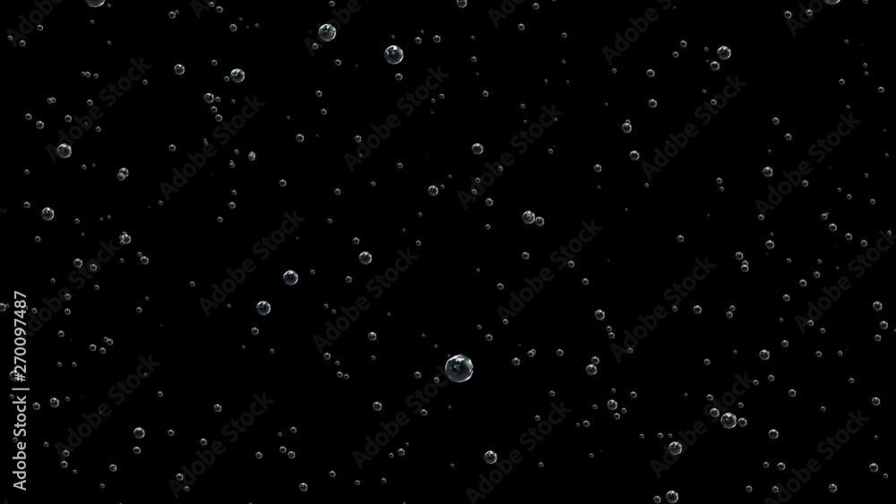 Bubbles of different sizes.Bubbles of champagne thin threads rise to the top.Champagne bottle is opened and sprinkled. Slow motion, black background. Bubbles of different sizes.Bubbles of champagne thin threads rise to the top.Champagne bottle is opened and sprinkled. Slow motion, black background.