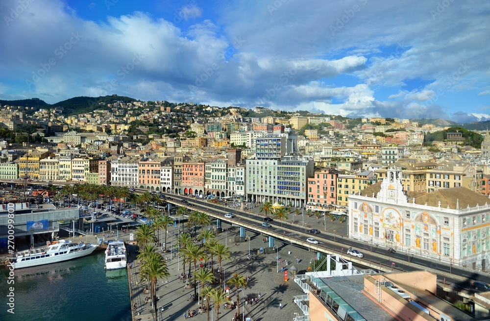 Top aerial scenic panoramic view from above of old historical centre quarter and modern districts of european city Genoa (Genova) and harbor of Ligurian and Mediterranean Sea, Liguria, Italy