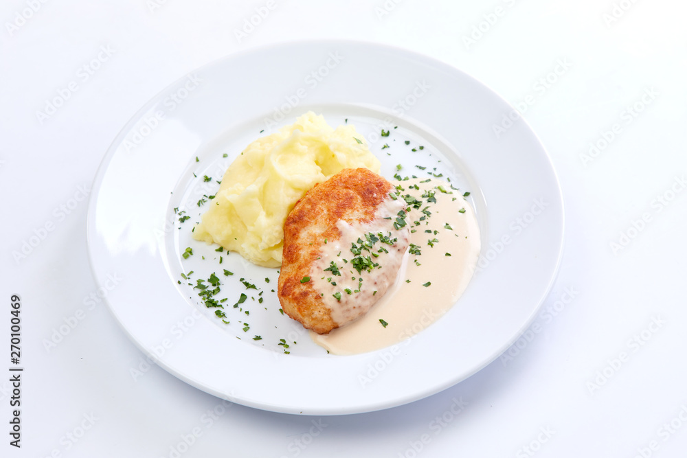 cutlet with mashed potato on the white background