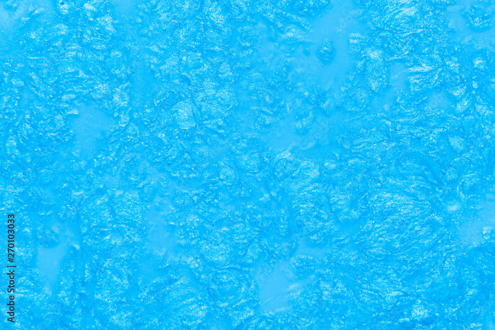Abstract light blue paint background. Acrylic clear glittering pattern texture. Rough uneven surface. Glossy shiny color mix Abstract light blue paint background. Acrylic clear glittering pattern texture. Rough uneven surface. Glossy shiny color mix