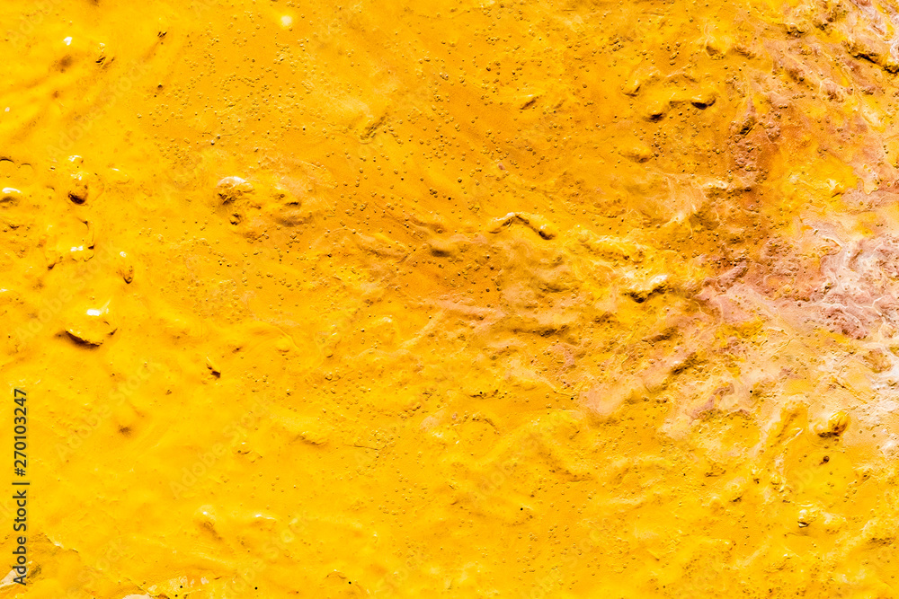 Abstract art texture background. Sandy landscape design. Bright yellow paint with grainy effect. Abstract art texture background. Sandy landscape design. Bright yellow paint with grainy effect.