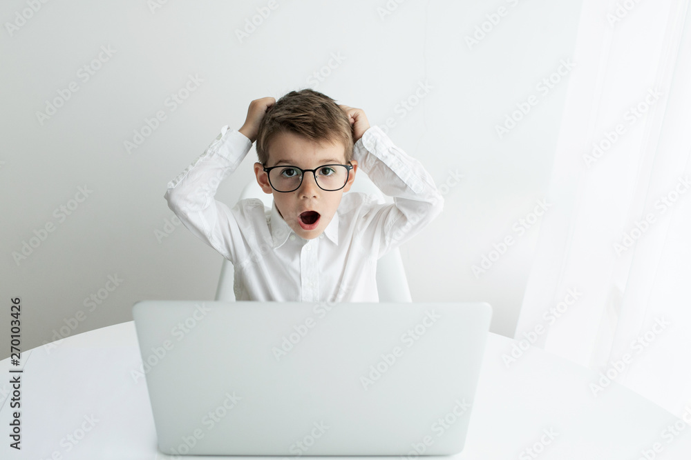 Young businessman working with laptop at office Young businessman working with laptop at office