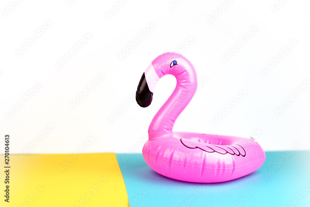 Giant inflatable Flamingo on a colourful background, pool float party, trendy summer concept Giant inflatable Flamingo on a colourful background, pool float party, trendy summer concept