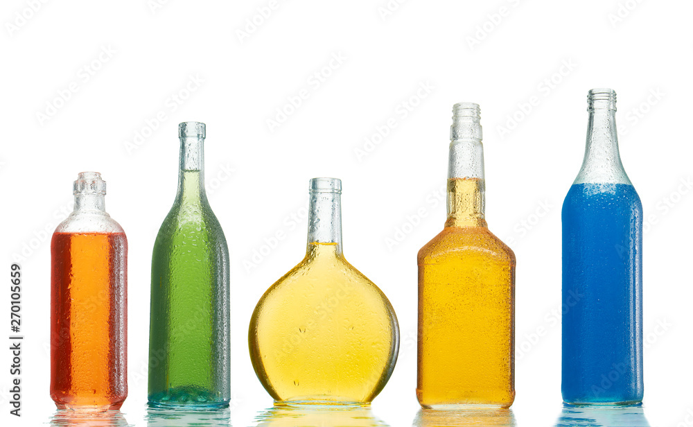 Various alcoholic drinks in transparent bottles Various alcoholic drinks in transparent bottles