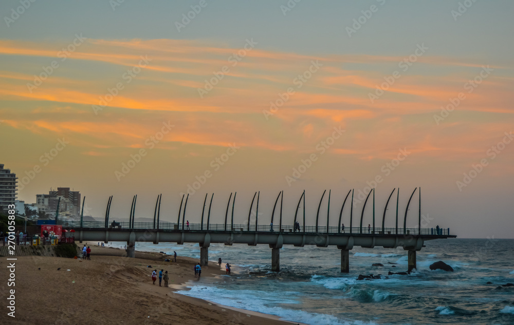 Beautiful Umhlanga Promenade Pier a whalebone made pier in Kwazulu Natal Durban North South Africa during sunset Beautiful Umhlanga Promenade Pier a whalebone made pier in Kwazulu Natal Durban North South Africa during sunset