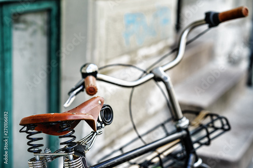 Parked old bicycles on the street of the Bike European city
