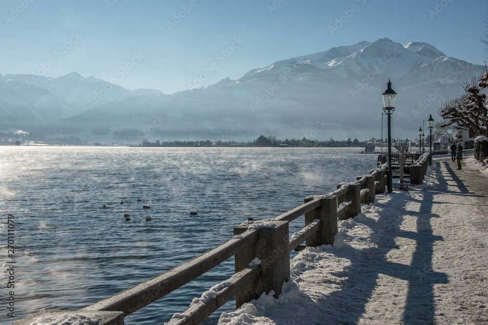 Winter landscape with mountains and lake