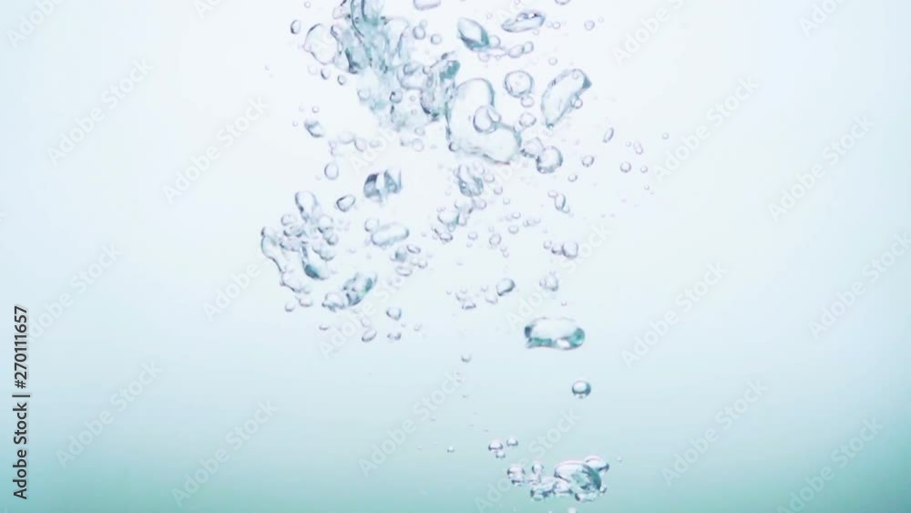Tomato splashing into water, slow motion Tomato splashing into water, slow motion