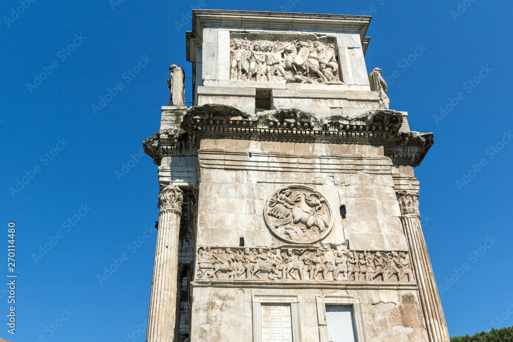 Ancient Arch of Constantine near Colosseum in city of Rome, Italy