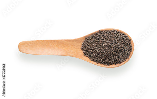 Perilla herb seed in wood spoon isolated on white background. top view