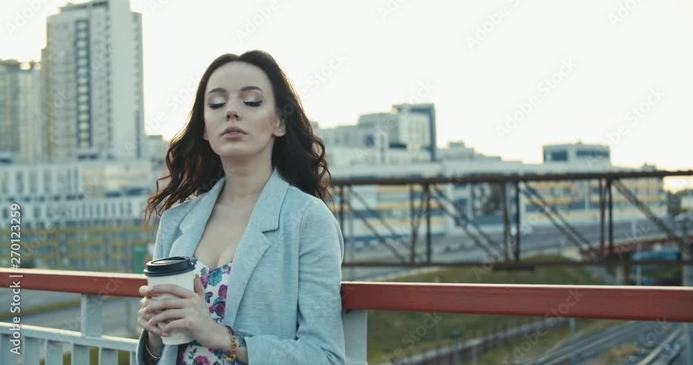 woman drinking coffee from cup woman drinking coffee from cup