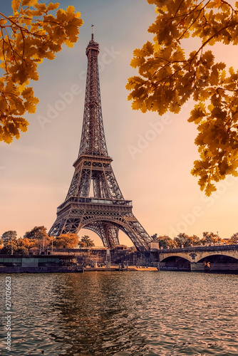 Eiffel tower during the autumn in Paris at sunset 