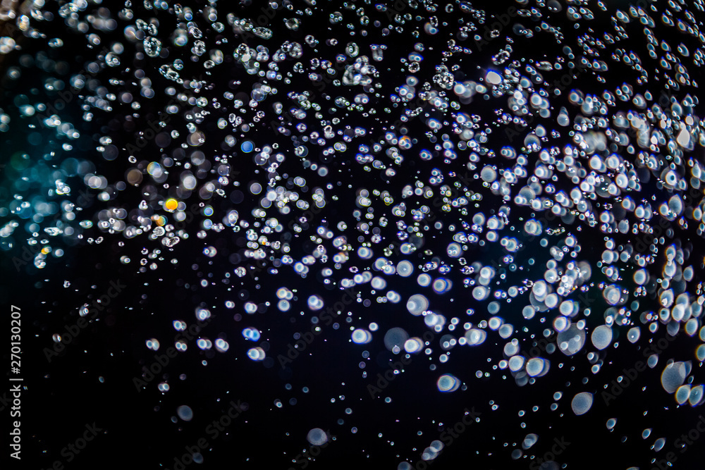 Colorful blur bokeh defocused on black Colorful blur bokeh defocused on black