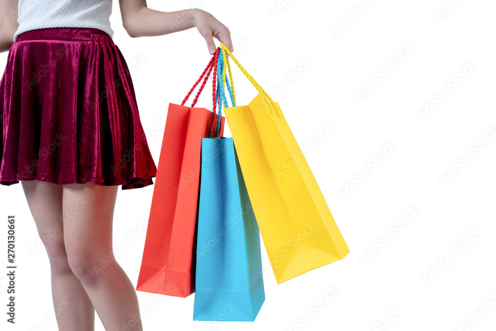 Happy woman in summer enjoying shopping holding colorful shopping bag on white background, shopping concept, isolate concept.