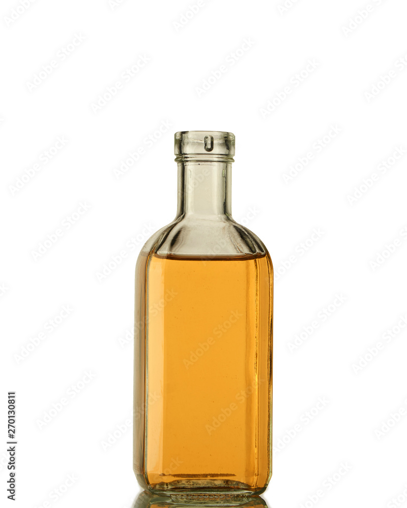 A bottle of strong alcohol in a transparent bottle
