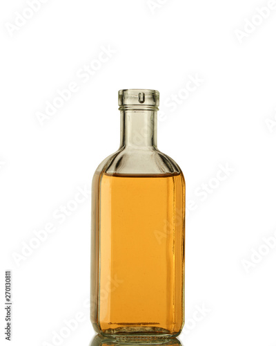 A bottle of strong alcohol in a transparent bottle