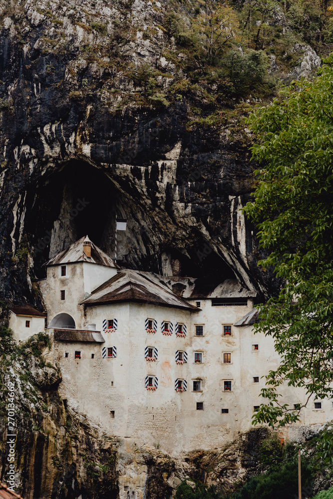 Renaissance castle by a cave