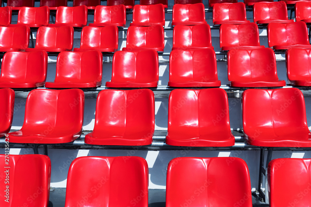 row of red chair in football sport stadium background row of red chair in football sport stadium background