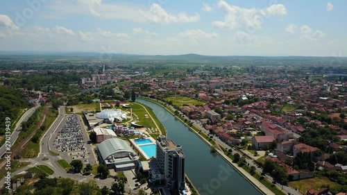 View of the city of Oradea from above, showcasing the aqua park and crisul repede river. photo
