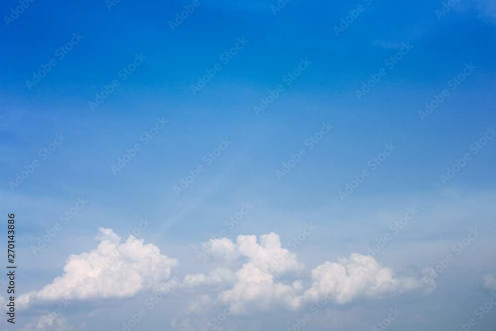 Blue sky background with white clouds group patterns and copy space Blue sky background with white clouds group patterns and copy space