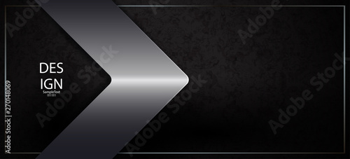 Textural abstract black background with an arrow of a metal shade