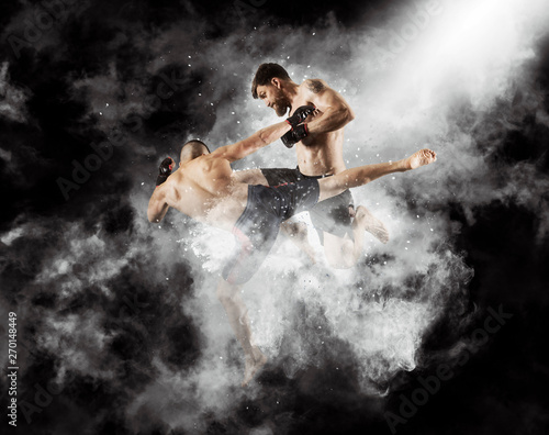 MMA boxers fighters fight in fights without rules © Andrey Burmakin